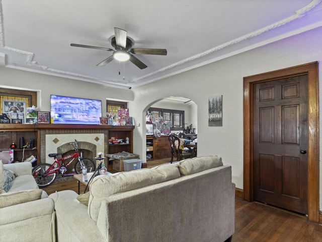 2753 N 60th St Unit 2755, Milwaukee, WI 53210 - living area with a ceiling fan, baseboards, dark wood-style flooring, ornamental molding, and arched walkways