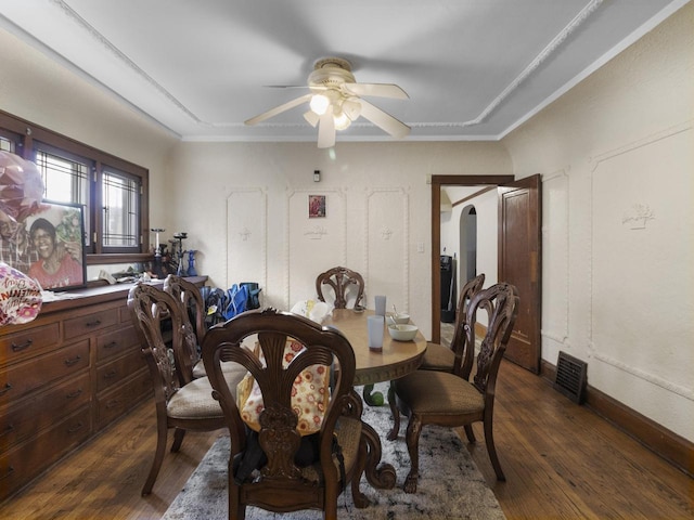 2753 N 60th St Unit 2755, Milwaukee, WI 53210 - dining space with arched walkways, a ceiling fan, visible vents, and dark wood finished floors