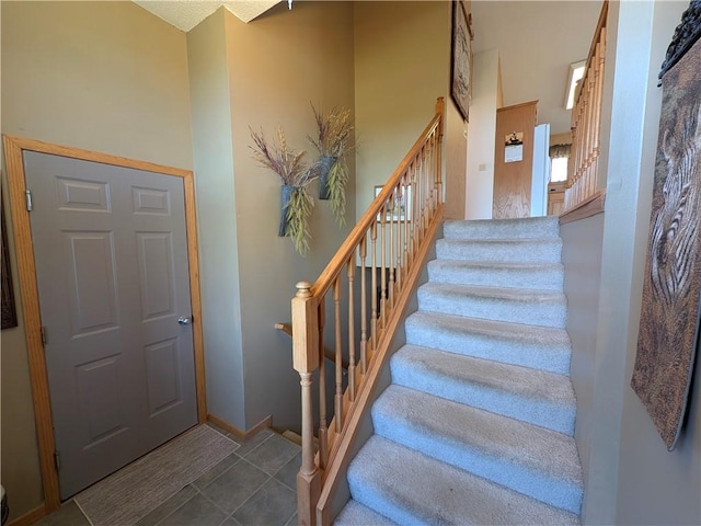 1380 101st Cir, Amery, WI 54001 - stairway featuring baseboards