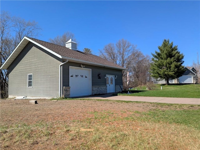 1380 101st Cir, Amery, WI 54001 - view of home's exterior with a lawn, a chimney, and roof with shingles