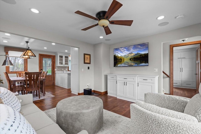 1430 Park Ave, West Bend, WI 53090 - living room with ceiling fan, dark wood-type flooring, recessed lighting, and baseboards