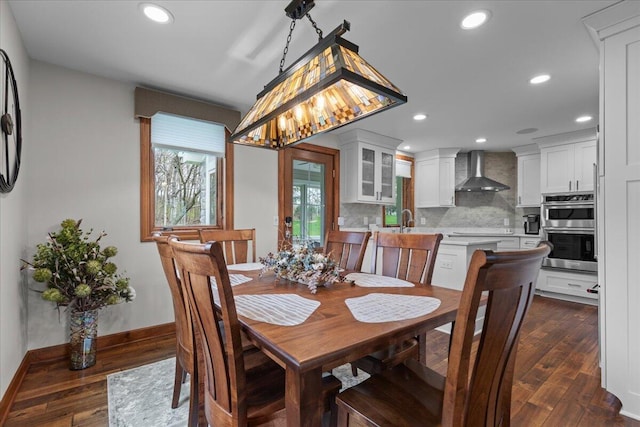 1430 Park Ave, West Bend, WI 53090 - dining room with baseboards, dark wood-style flooring, and recessed lighting