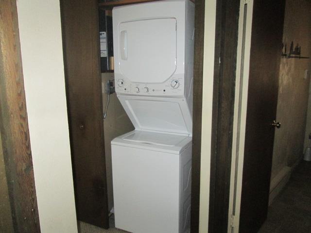 N3880 Deer Path, Hancock, WI 54943 - washroom with stacked washer / drying machine