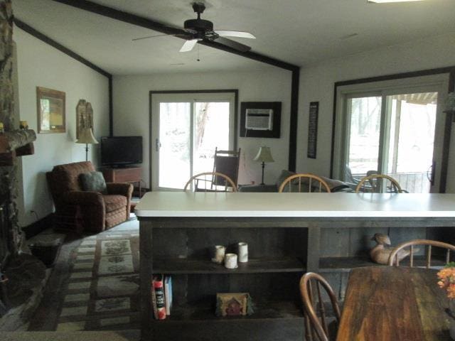 N3880 Deer Path, Hancock, WI 54943 - kitchen with a ceiling fan, light countertops, and open floor plan