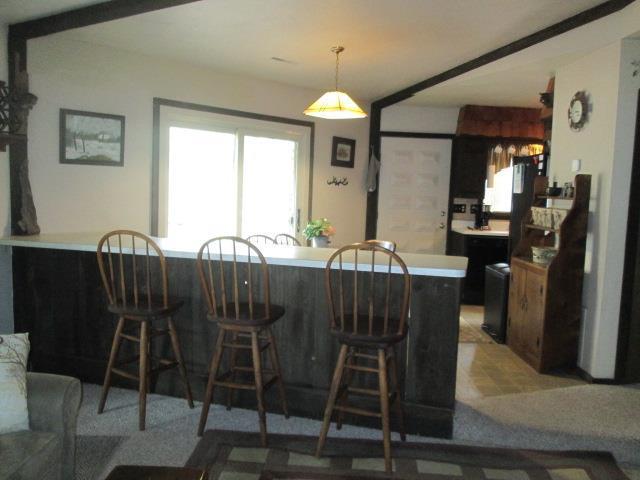 N3880 Deer Path, Hancock, WI 54943 - dining room with light colored carpet