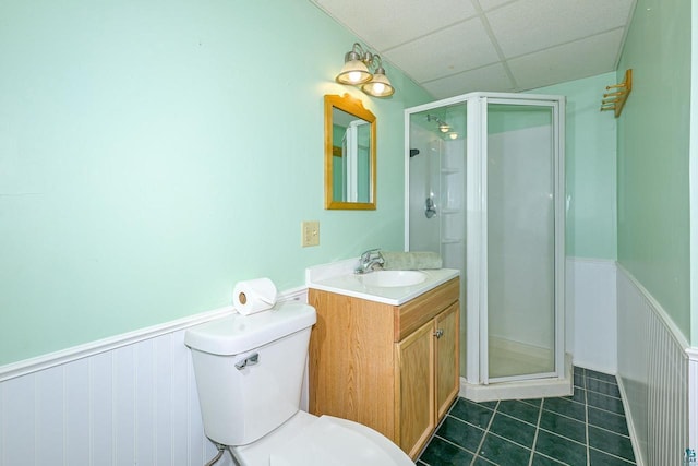 7113 E County Rd E, South Range, WI 54874 - bathroom featuring a wainscoted wall, a shower stall, tile patterned flooring, vanity, and a drop ceiling