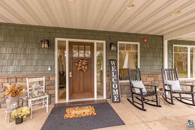 4527 E Marquardt Rd, Superior, WI 54880 - entrance to property featuring a porch and stone siding