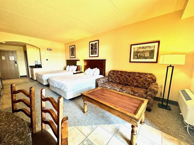 2504 River Rd Unit 7218, Wisconsin Dells, WI 53965 - tiled bedroom with carpet and arched walkways