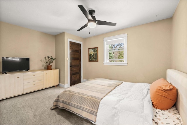 175 Old Wausau Rd, Stevens Point, WI 54481 - bedroom with light carpet, ceiling fan, and baseboards