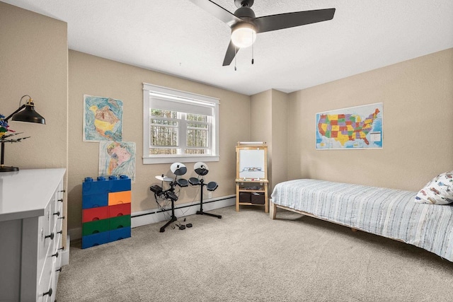 175 Old Wausau Rd, Stevens Point, WI 54481 - carpeted bedroom with a baseboard heating unit and ceiling fan