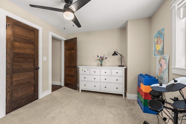 175 Old Wausau Rd, Stevens Point, WI 54481 - bedroom featuring light colored carpet, a ceiling fan, and baseboards