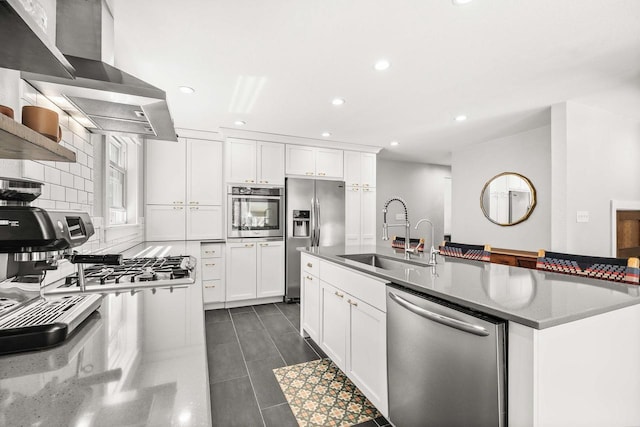 175 Old Wausau Rd, Stevens Point, WI 54481 - kitchen featuring stainless steel appliances, a sink, wall chimney range hood, white cabinets, and recessed lighting