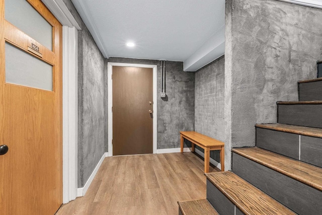 175 Old Wausau Rd, Stevens Point, WI 54481 - foyer entrance featuring wood finished floors, stairs, baseboards, and recessed lighting