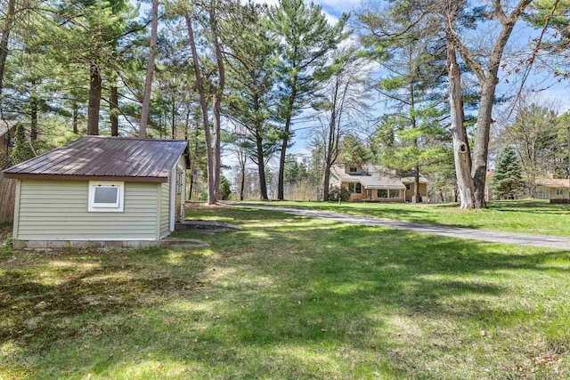 175 Old Wausau Rd, Stevens Point, WI 54481 - view of green lawn featuring an outdoor structure and a shed