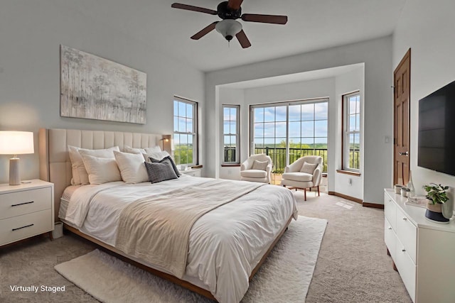 580 S Stone Ridge Dr, Lake Geneva, WI 53147 - bedroom with light colored carpet, baseboards, ceiling fan, and access to exterior