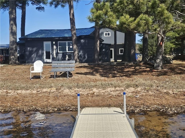 2097 Sunnyside Rd, Danbury, WI 54830 - rear view of house with metal roof and a water view