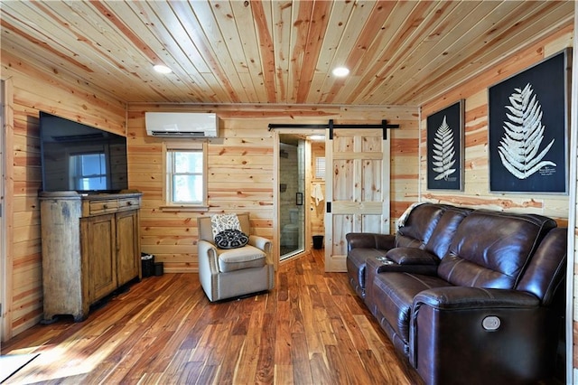 2097 Sunnyside Rd, Danbury, WI 54830 - living area featuring a barn door, wood ceiling, a wall unit AC, wood walls, and hardwood / wood-style floors