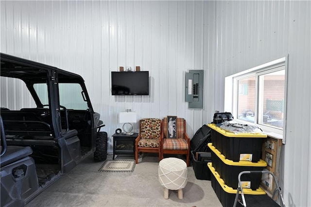 2097 Sunnyside Rd, Danbury, WI 54830 - living area featuring electric panel and concrete floors