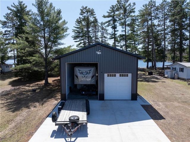2097 Sunnyside Rd, Danbury, WI 54830 - detached garage featuring concrete driveway