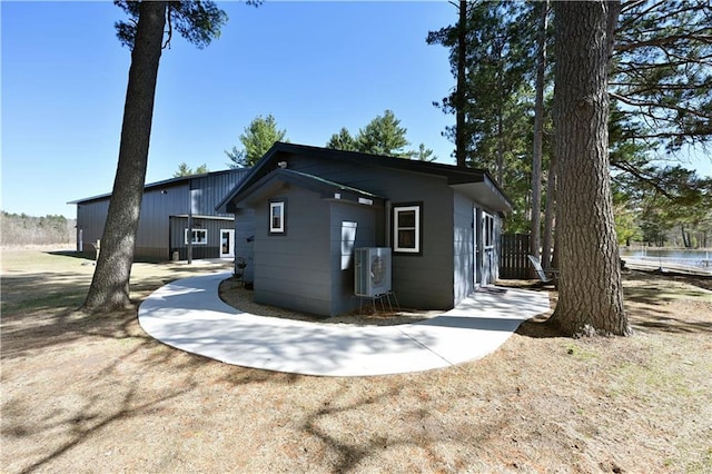 2097 Sunnyside Rd, Danbury, WI 54830 - view of property exterior with ac unit