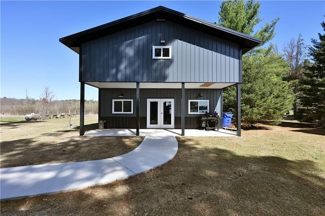 2097 Sunnyside Rd, Danbury, WI 54830 - rear view of property with a patio, french doors, and a yard