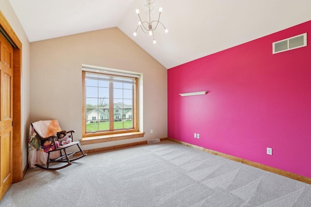 unfurnished room with a chandelier, lofted ceiling, carpet floors, and baseboards