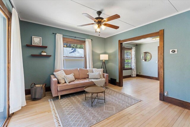 5425 Gettle Ave, Madison, WI 53705 - living room with wood-type flooring, ceiling fan, baseboards, and ornamental molding