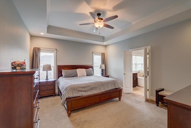 824 Richard Way, Waunakee, WI 53597 - bedroom with a tray ceiling, light carpet, crown molding, ensuite bath, and baseboards