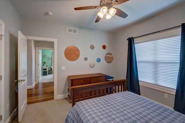 824 Richard Way, Waunakee, WI 53597 - bedroom with carpet, a ceiling fan, and baseboards