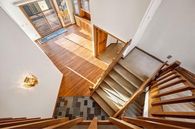 stairs with wood finished floors