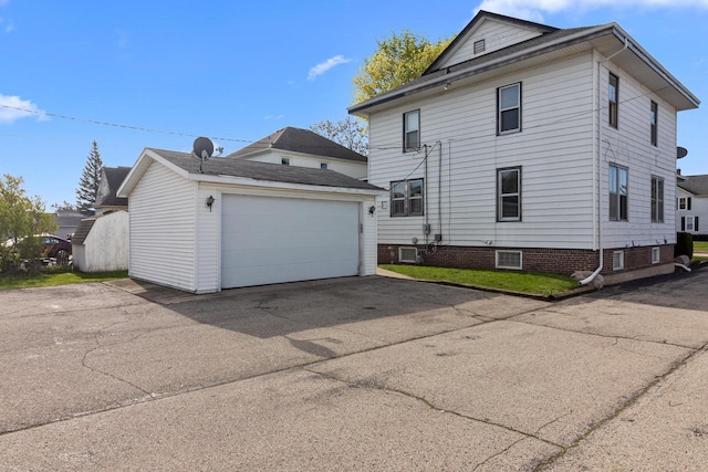 210 E Walworth St, Elkhorn, WI 53121 - view of home's exterior featuring an outdoor structure and a detached garage