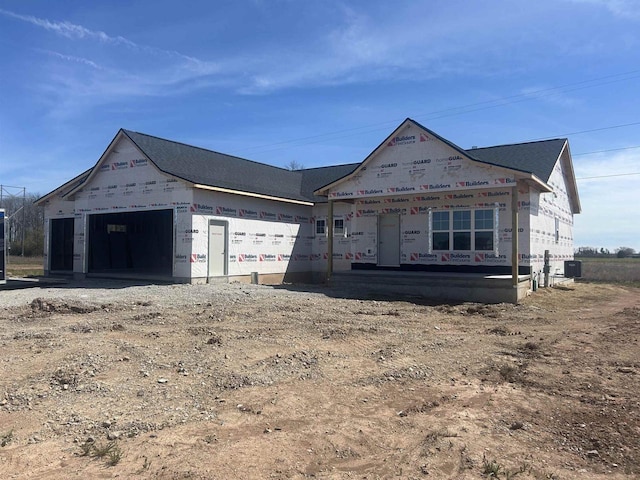 property under construction with a garage