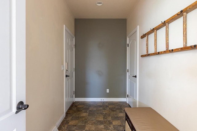 corridor with stone finish flooring