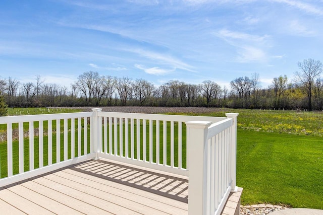 wooden terrace with a yard