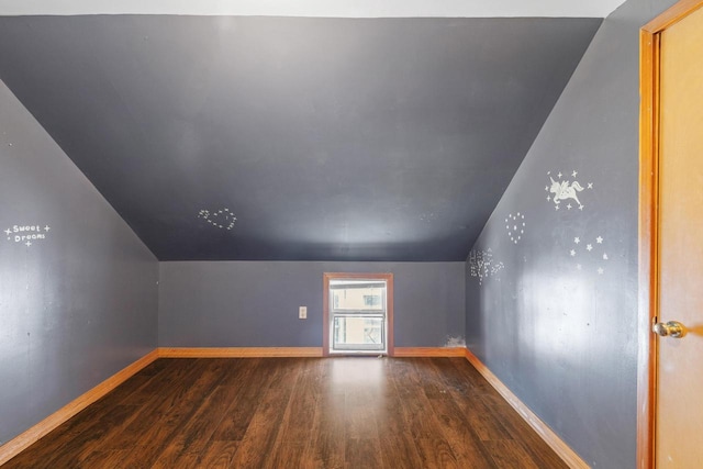 1214 S 17th St, Sheboygan, WI 53081 - bonus room with wood finished floors, baseboards, and lofted ceiling