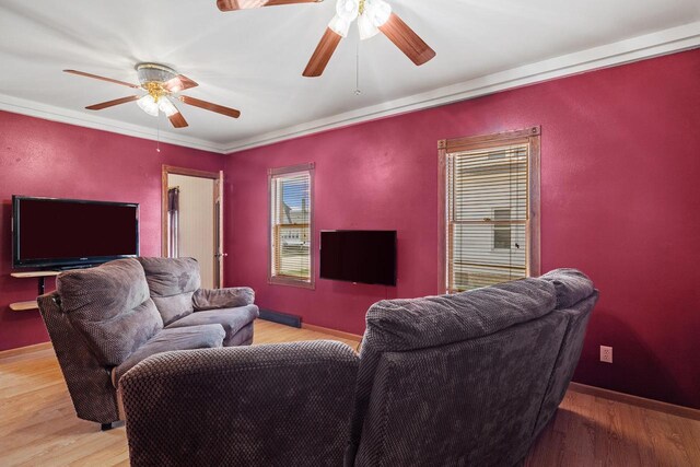 1214 S 17th St, Sheboygan, WI 53081 - living room featuring a ceiling fan, healthy amount of natural light, and light wood-style flooring