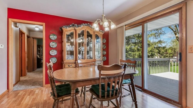 3710 Mcelroy St, Eau Claire, WI 54701 - dining space with plenty of natural light, light wood-style flooring, and a chandelier