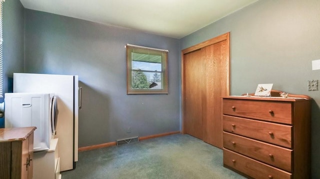 3710 Mcelroy St, Eau Claire, WI 54701 - bedroom with carpet flooring, a closet, baseboards, and fridge