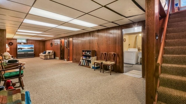 3710 Mcelroy St, Eau Claire, WI 54701 - finished below grade area with washer / clothes dryer, wooden walls, carpet floors, a drop ceiling, and stairs