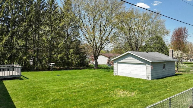 3710 Mcelroy St, Eau Claire, WI 54701 - view of yard featuring a detached garage, an outbuilding, and a wooden deck