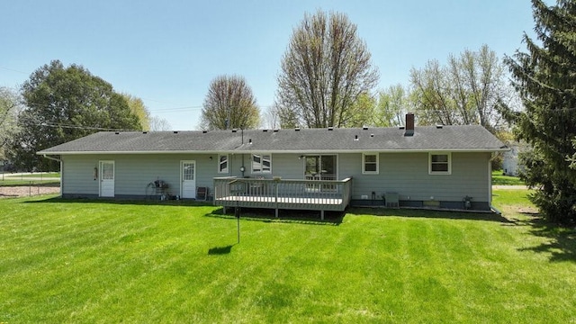 3710 Mcelroy St, Eau Claire, WI 54701 - rear view of house with a wooden deck, a lawn, and a chimney