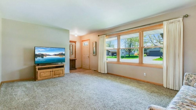 3710 Mcelroy St, Eau Claire, WI 54701 - unfurnished living room featuring light carpet and baseboards