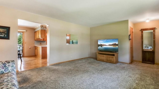 3710 Mcelroy St, Eau Claire, WI 54701 - unfurnished living room with light carpet and baseboards