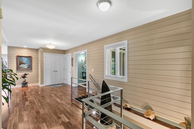 W11055 Eagle Dr, Lodi, WI 53555 - entrance foyer featuring wood walls, wood finished floors, and baseboards