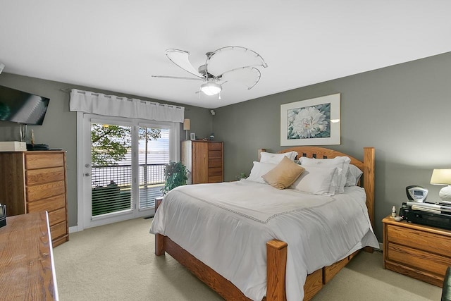 W11055 Eagle Dr, Lodi, WI 53555 - bedroom with access to exterior, carpet flooring, and a ceiling fan