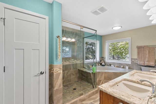 W11055 Eagle Dr, Lodi, WI 53555 - bathroom with a bath, a shower stall, and vanity