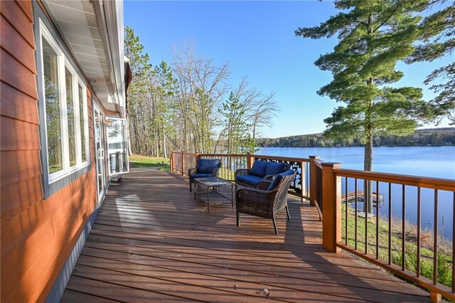 W5937 Ross Rd, Trego, WI 54888 - wooden terrace featuring a water view and outdoor lounge area