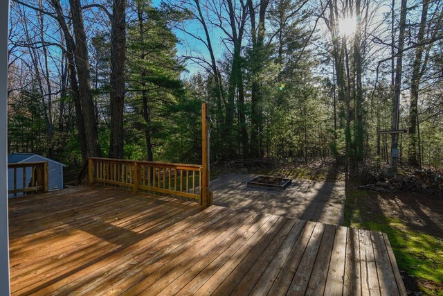 6615 Birchwood Shores Ln, Oconto Falls, WI 54154 - wooden terrace with an outbuilding
