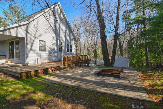 6615 Birchwood Shores Ln, Oconto Falls, WI 54154 - wooden terrace featuring an outdoor structure