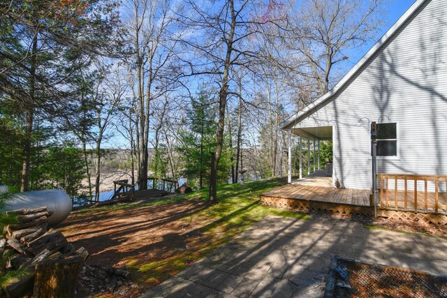 6615 Birchwood Shores Ln, Oconto Falls, WI 54154 - view of yard featuring a wooden deck